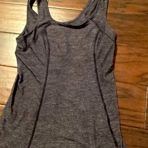 Purple Lululemon tank top.